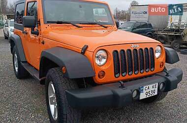 Внедорожник / Кроссовер Jeep Wrangler 2012 в 