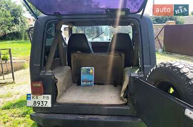 Внедорожник / Кроссовер Jeep Wrangler 1992 в 