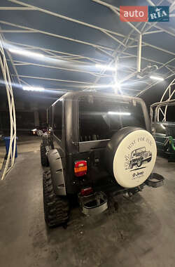 Внедорожник / Кроссовер Jeep Wrangler 1996 в  фото 4 Внедорожник / Кроссовер Jeep Wrangler 1996 в