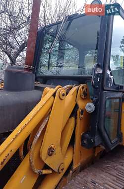 Экскаватор погрузчик John Deere 1210G 1988 в Киеве