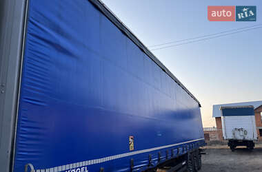 Тентований борт (штора) - напівпричіп Kogel S 24 2011 в  фото 2 Тентований борт (штора) - напівпричіп Kogel S 24 2011 в