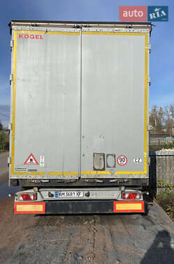 Тентованный борт (штора) - полуприцеп Kogel SN 24 2012 в Коростене Тентованный борт (штора) - полуприцеп Kogel SN 24 2012 в Коростене