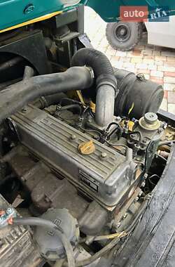 Фронтальні навантажувачі Komatsu FD 1997 в Великій Багачці