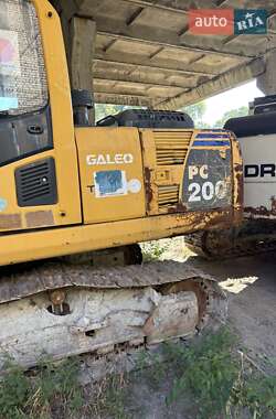 Гусеничный экскаватор Komatsu PC 210 2011 в 