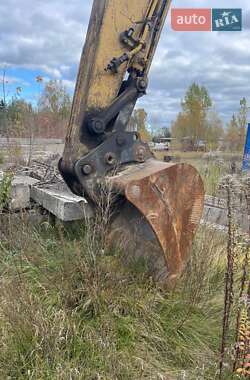 Гусеничный экскаватор Komatsu PC 210 2007 в 