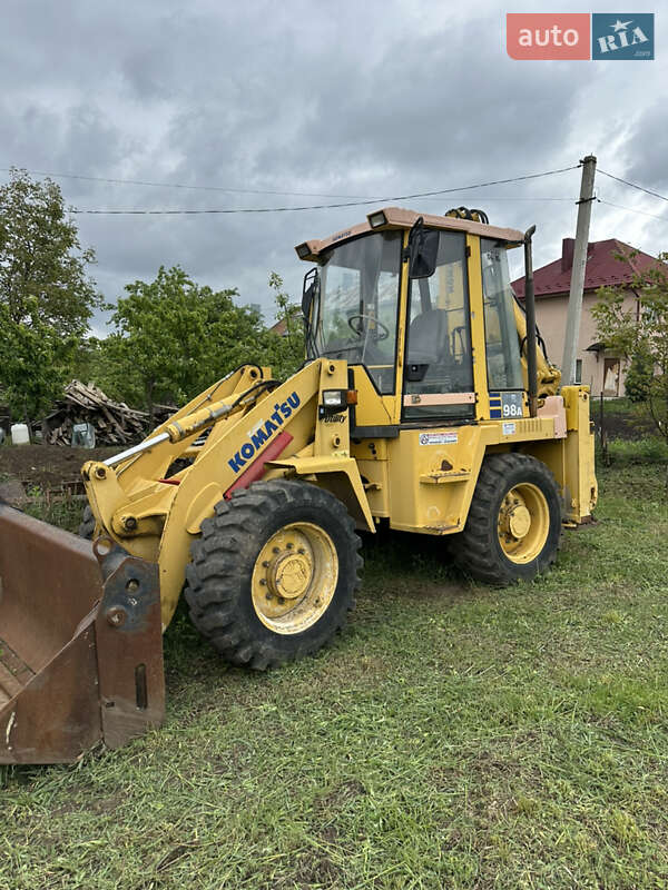 Экскаватор погрузчик Komatsu WB 2005 в 