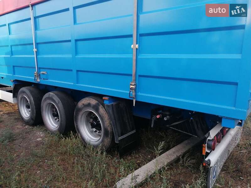 Бортовой полуприцеп Krone SD 27 2009 в Сарате