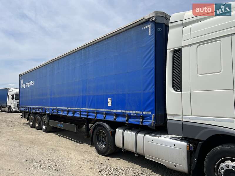Тентований борт (штора) - напівпричіп Krone SD 27 2011 в 