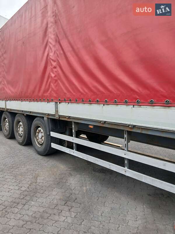 Бортовий напівпричіп Krone SDP 27 2011 в Львові