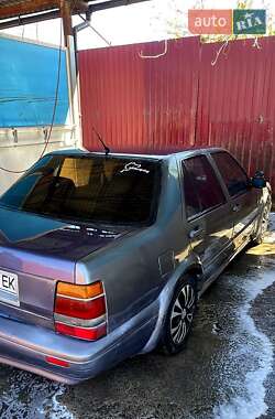 Седан Lancia Thema 1986 в 