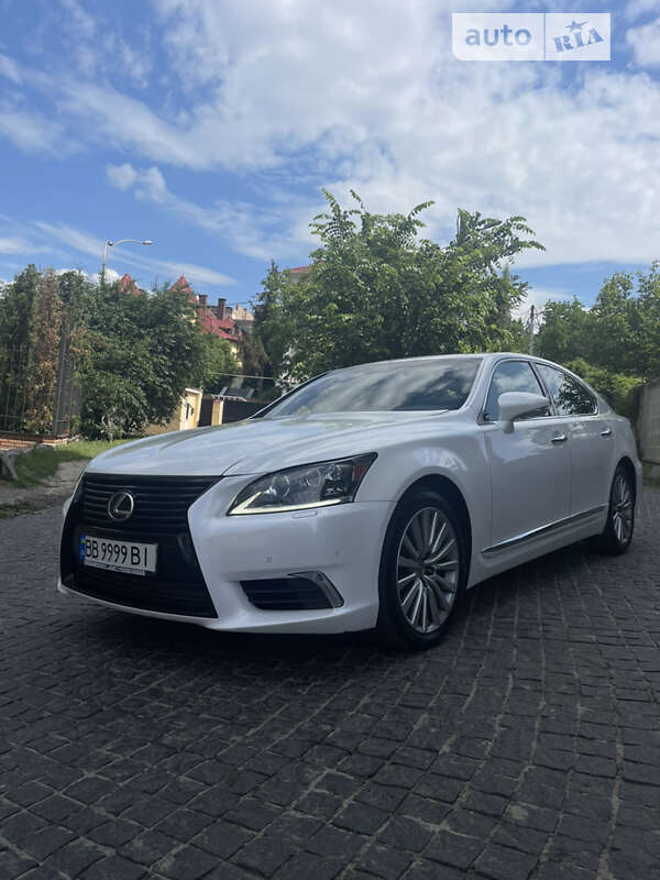 2013 Lexus LS, VIN JTHCL1EF7D5018316:plate — photo 1 (autoria)