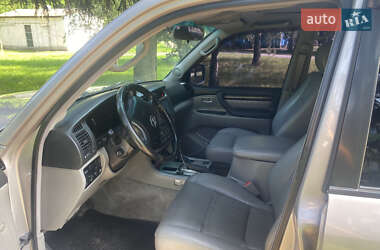 Внедорожник / Кроссовер Lexus LX 2003 в 