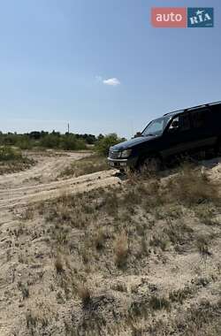 Внедорожник / Кроссовер Lexus LX 2004 в 