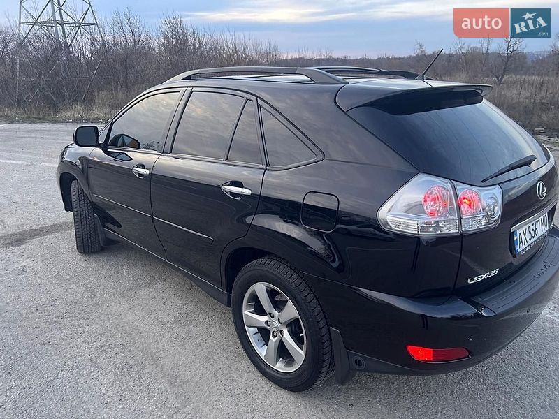 2008 Lexus RX, VIN 2T2HK31U28C091575:plate — фото 1 (autoria)