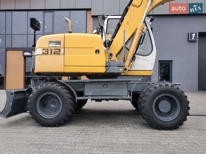 Колесный экскаватор Liebherr 312 2010 в Ровно