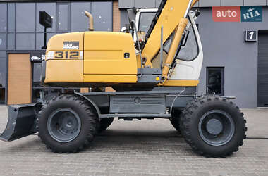 Колесный экскаватор Liebherr 312 2010 в 