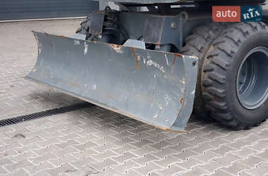 Колесный экскаватор Liebherr 312 2010 в 