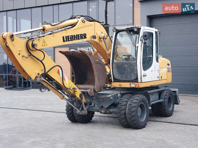 Колесный экскаватор Liebherr 312 2010 в Ровно