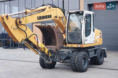 Колесный экскаватор Liebherr 312 2010 в 