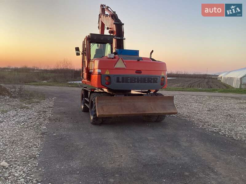Колесный экскаватор Liebherr 314 2008 в Виноградове