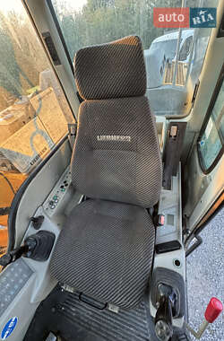 Колісний екскаватор Liebherr 900 Litronic 2010 в 