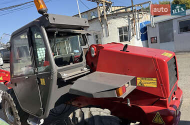 Телескопічні навантажувачі Manitou 728 1998 в 
