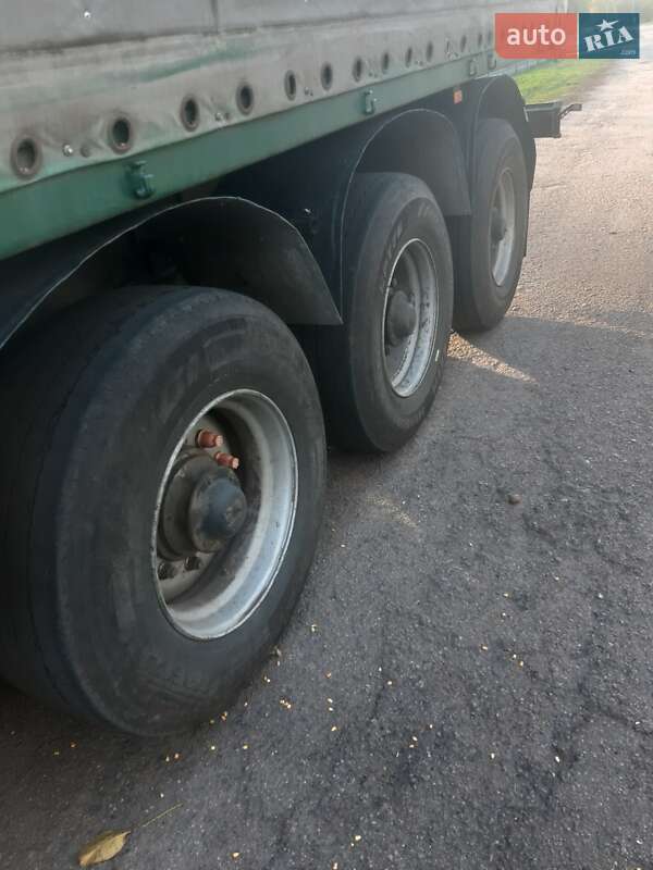 Зерновоз - полуприцеп МАЗ 9758 2005 в Лубнах