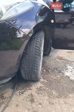 Хэтчбек Mazda 2 2009 в 
