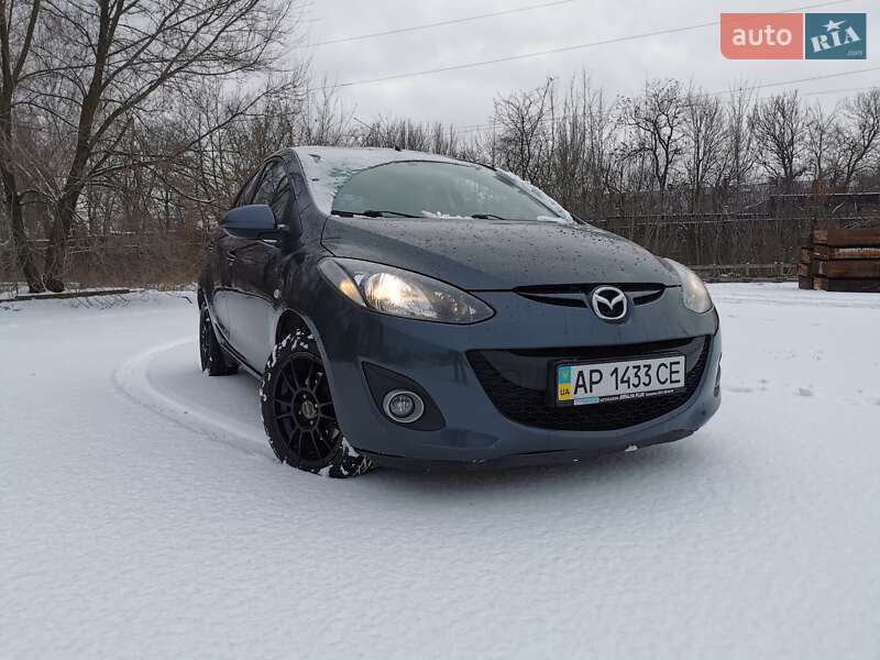 2011 Mazda 2, VIN JMZDE145500440292:plate — фото 1 (autoria)