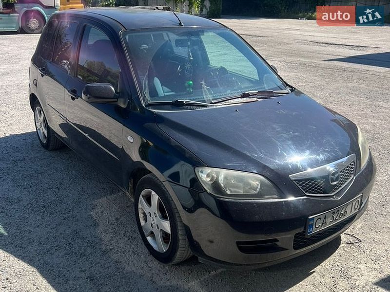 Mazda 2, photos from the listing