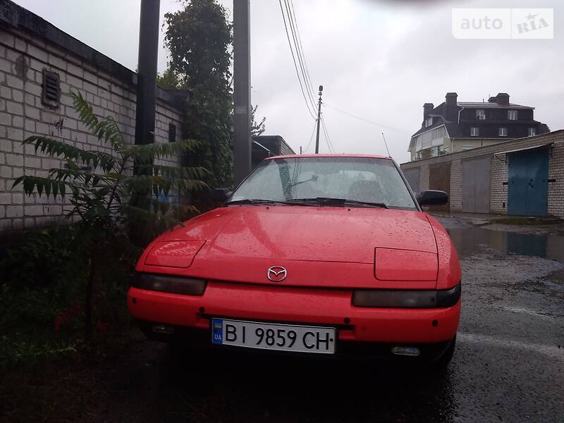 Хэтчбек Mazda 323 1994 в Кременчуге фото 12 Хэтчбек Mazda 323 1994 в Кременчуге