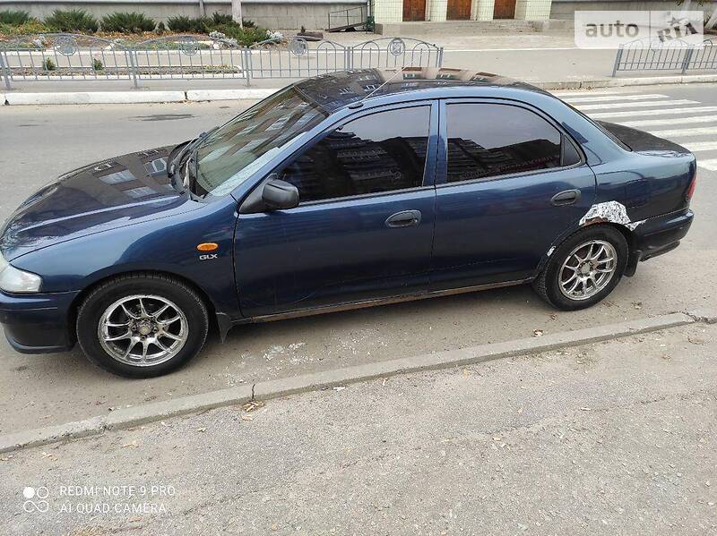 Седан Mazda 323 1998 в Харькове