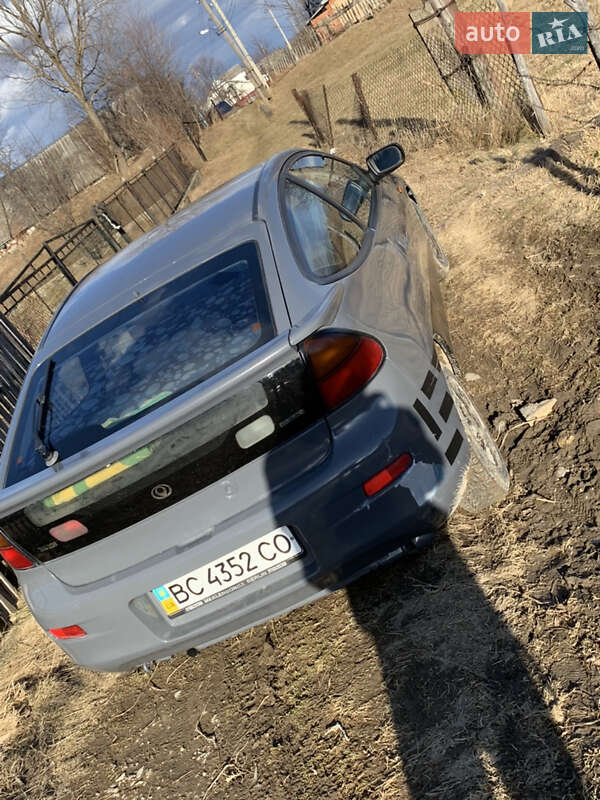 Седан Mazda 323 1996 в Надворной фото 26 Седан Mazda 323 1996 в Надворной