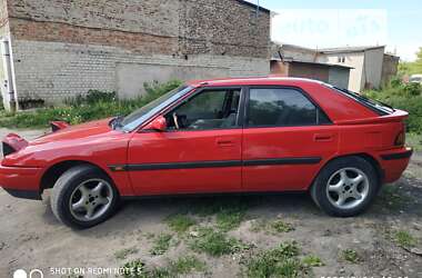 Хэтчбек Mazda 323 1990 в 