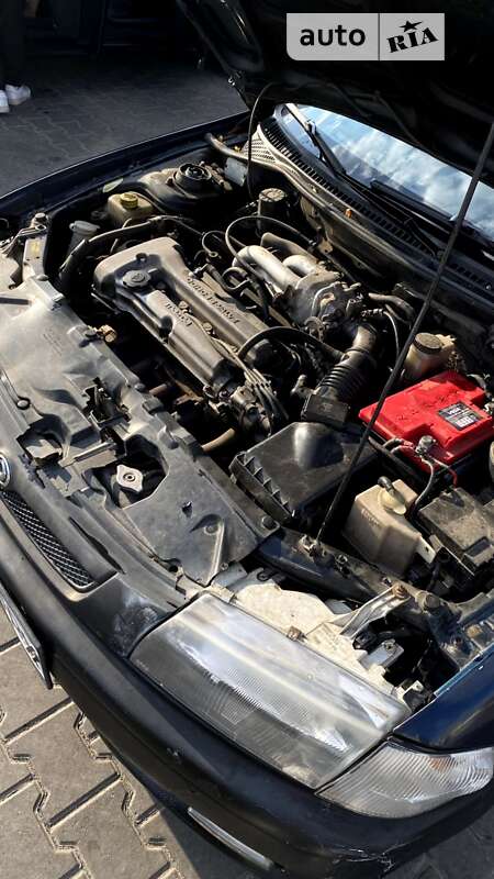 Седан Mazda 323 1997 в Одессе