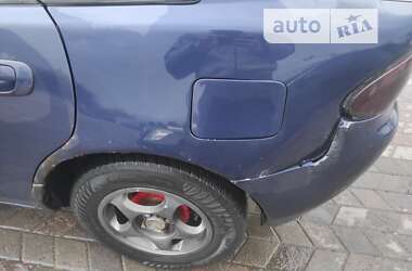 Хэтчбек Mazda 323 1996 в 
