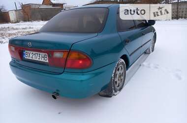 Седан Mazda 323 1996 в 