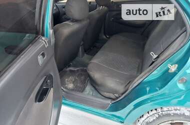 Седан Mazda 323 1996 в 