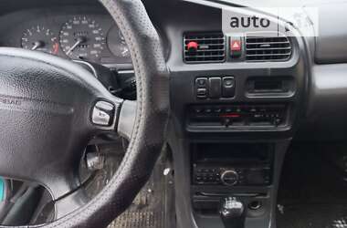 Седан Mazda 323 1996 в 