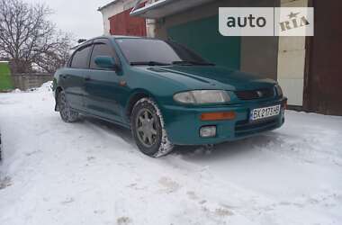 Седан Mazda 323 1996 в 