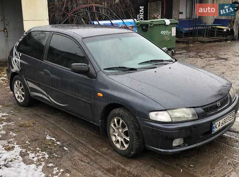 Седан Mazda 323 1998 в Гостомеле