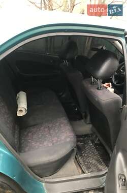 Седан Mazda 323 1997 в 