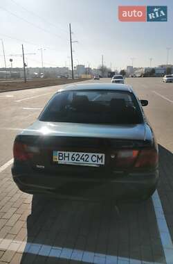 Седан Mazda 323 1996 в Одессе