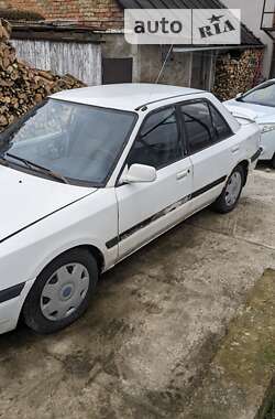 Седан Mazda 323 1995 в Ровно