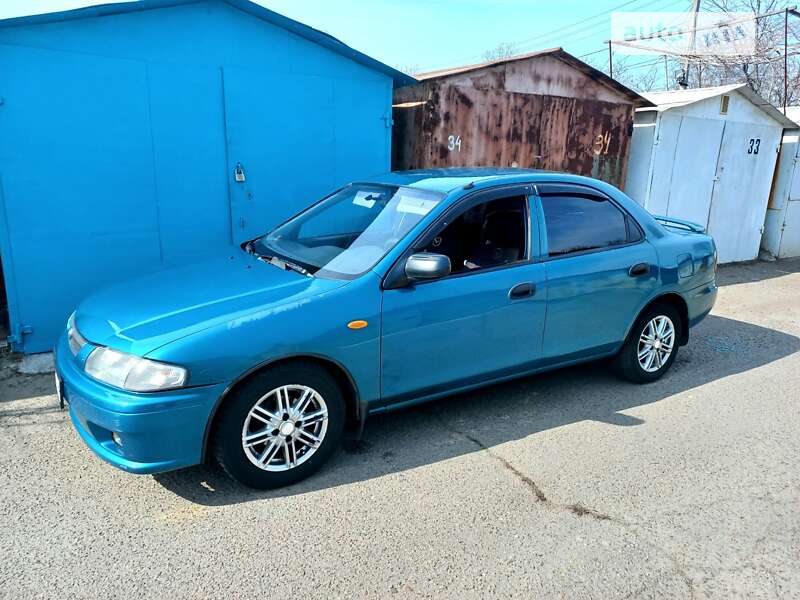 Седан Mazda 323 1998 в Одесі фото 10 Седан Mazda 323 1998 в Одесі