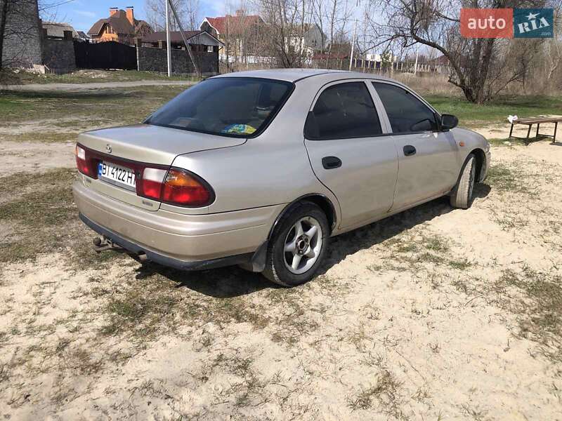 Седан Mazda 323 1998 в Кременчуге фото 4 Седан Mazda 323 1998 в Кременчуге