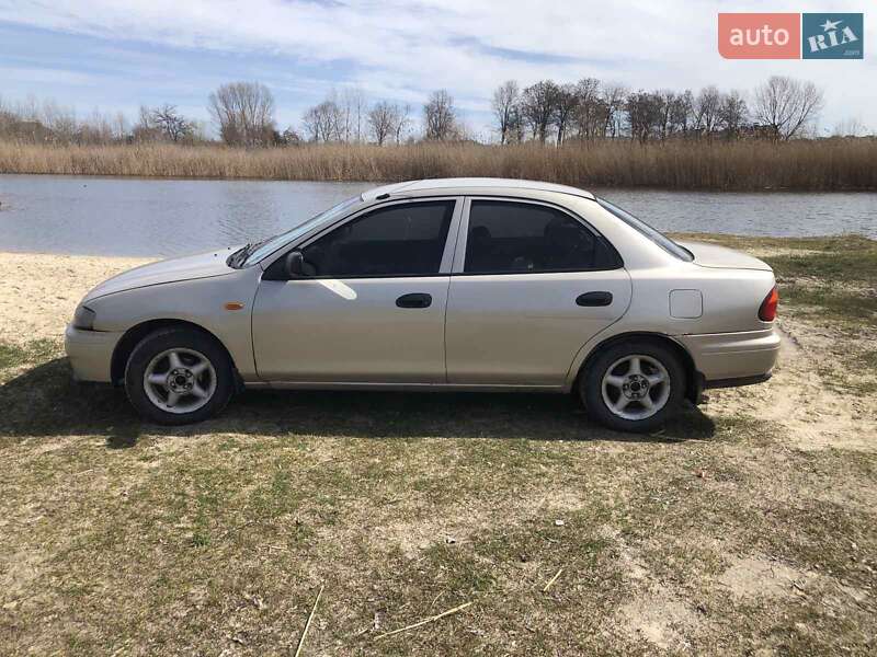 Седан Mazda 323 1998 в Кременчуге фото 3 Седан Mazda 323 1998 в Кременчуге