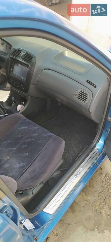 Седан Mazda 323 1999 в Днепре