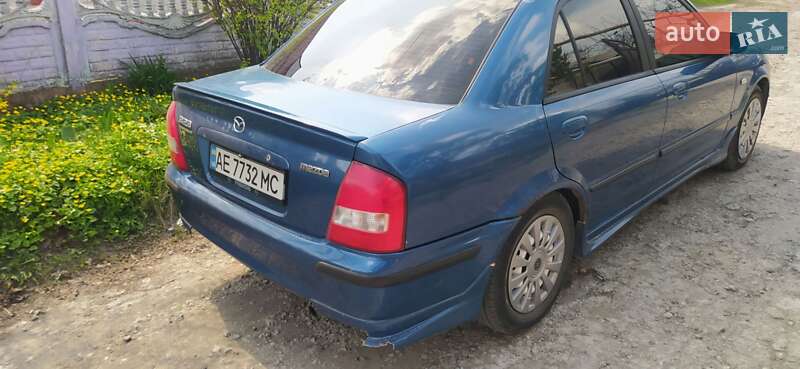 Седан Mazda 323 1999 в Днепре