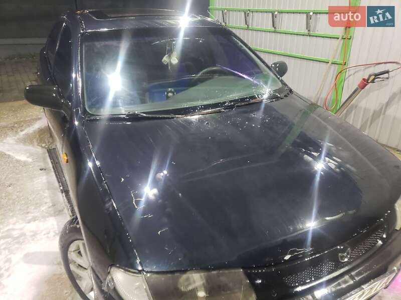 Седан Mazda 323 1995 в 